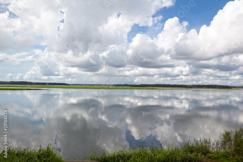 Dramatic Puffy White Clouds Reflected Smooth May River Bluffton