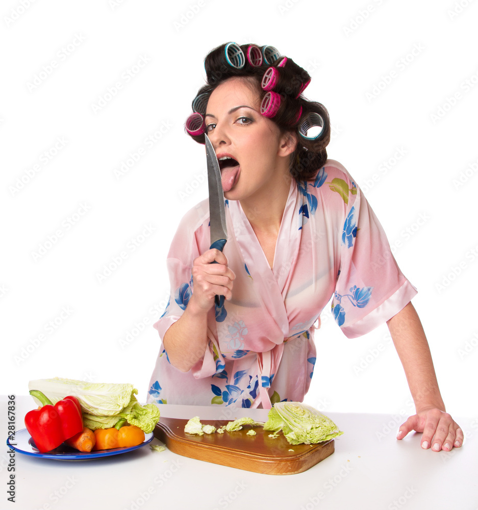 woman licking a knife foto de Stock Adobe Stock