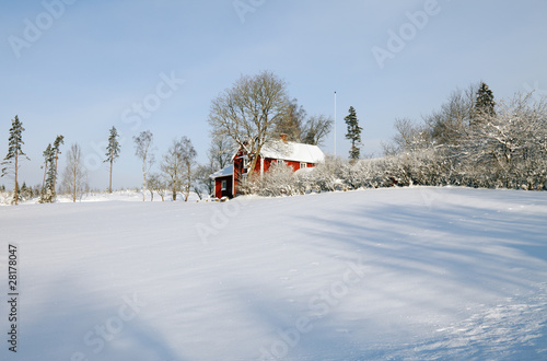 small farm in wintery sweden
