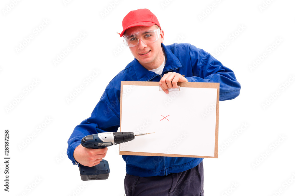 A young handyman with a drill showing his plans A young handyman with a drill showing his plans