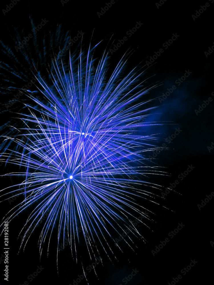Long Exposure of Blue Fireworks Against a Black Sky