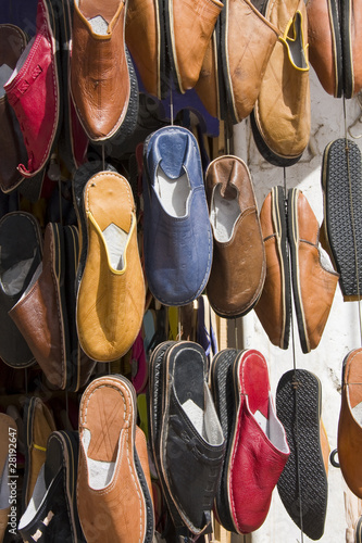 Shoes hanging outside a shop in Marrakech