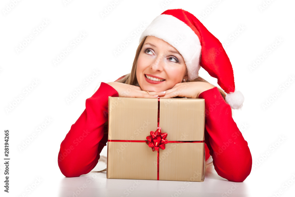 Woman in santa hat with christmas presents Woman in santa hat with christmas presents