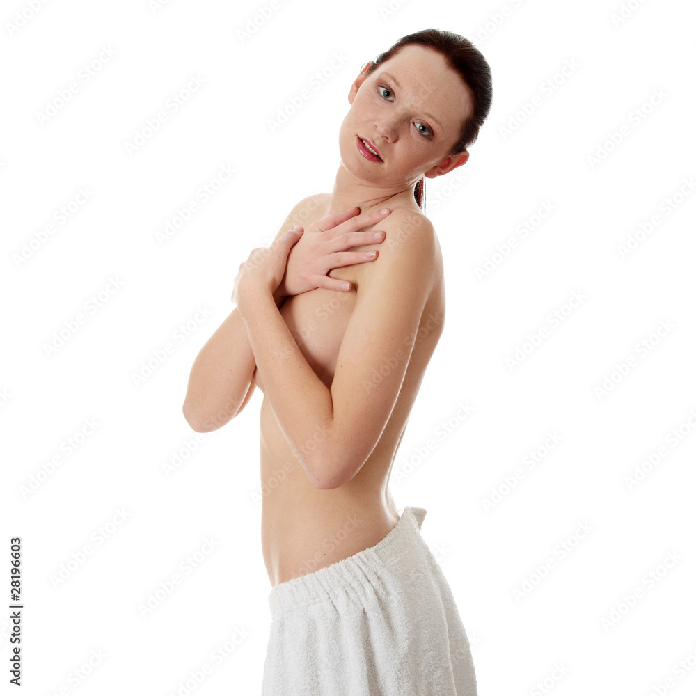Young topless woman with towel Young topless woman with towel