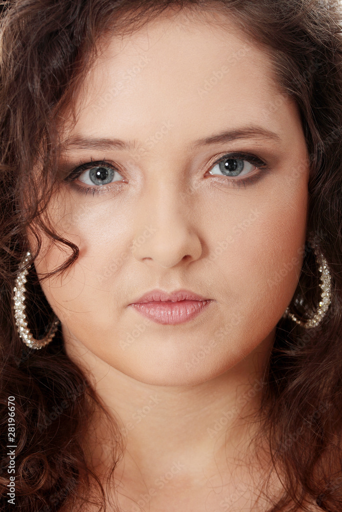 Obraz premium Young corpulent woman in elegant make up.