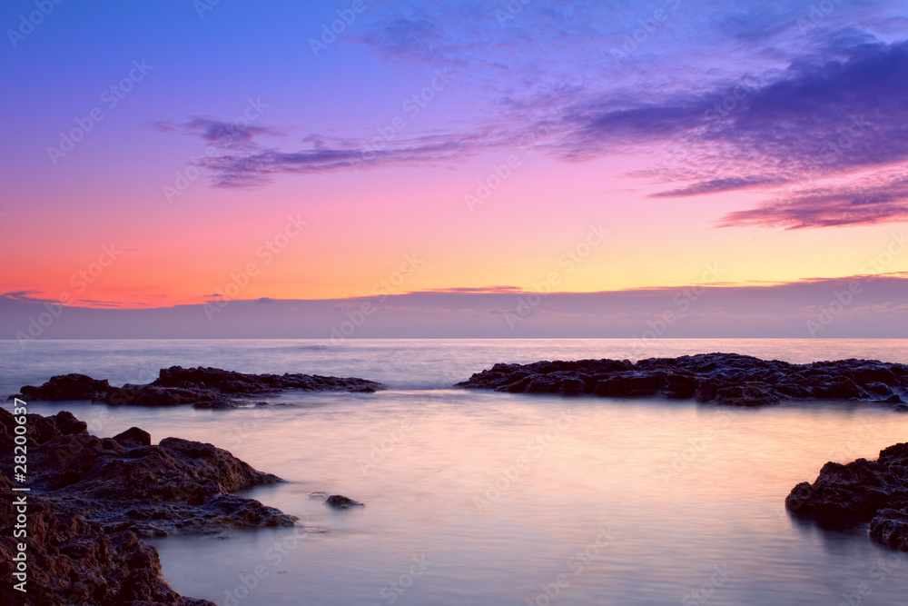 colorful sunrise on the rocky coast