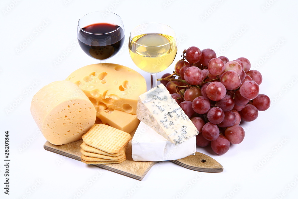Various types of cheese and red and white wine
