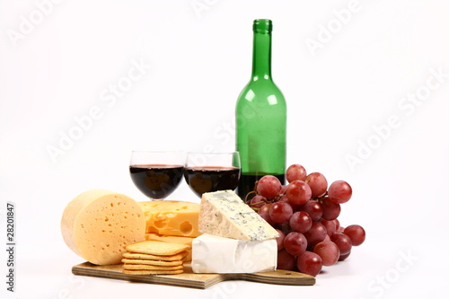 Various types of cheese and red wine