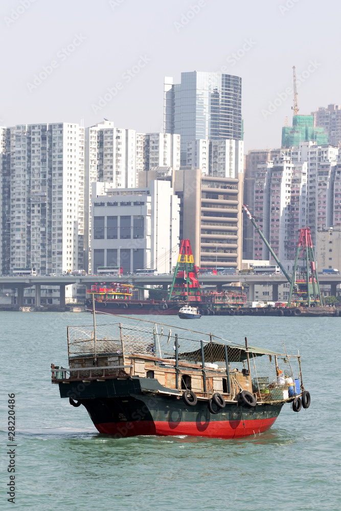 Traditional Chinese fishing junk in Victoria Harbor, Hong Kong