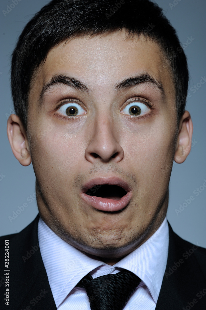 Portrait of stressed business man in formal suit and black tie h Portrait of stressed business man in formal suit and black tie h