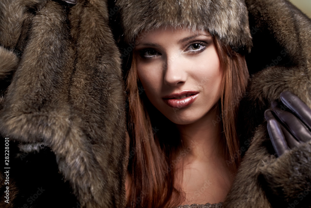 beautiful woman in a fur coat beautiful woman in a fur coat