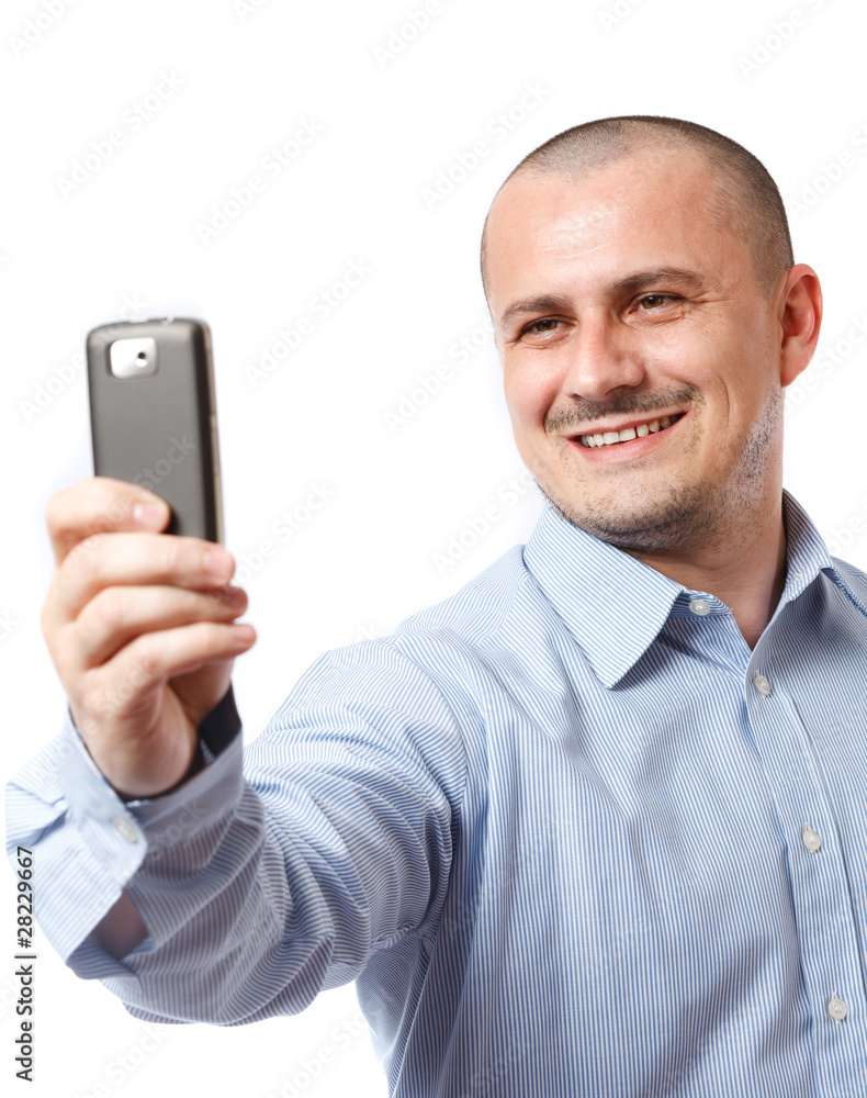 Businessman taking photos with cellphone Businessman taking photos with cellphone