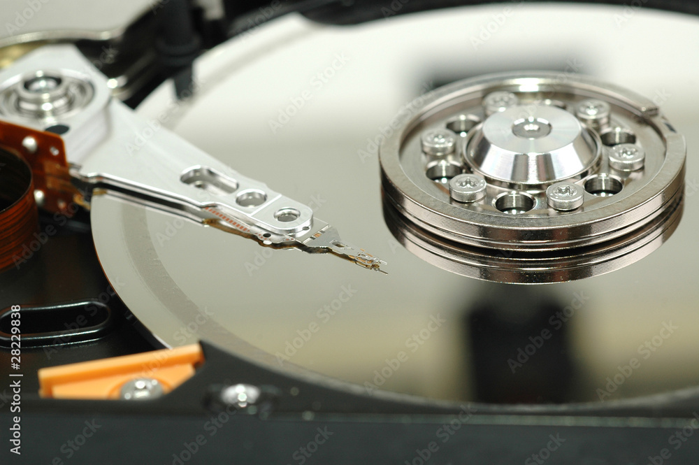 Close up of opened hard disk drive Close up of opened hard disk drive
