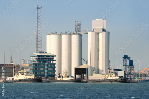 industrial port buildings and tug boats © Steve Mann