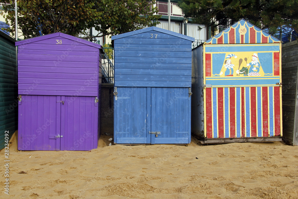 Naklejka premium Beach huts on sand