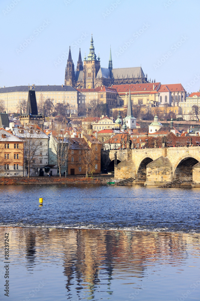 First Snow in Prague, gothic Castle with the Charles Bridge