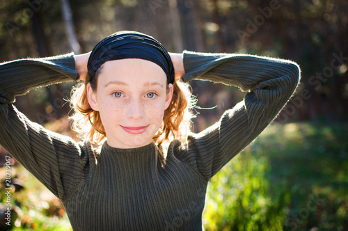 beautiful tween aged girl in evening light