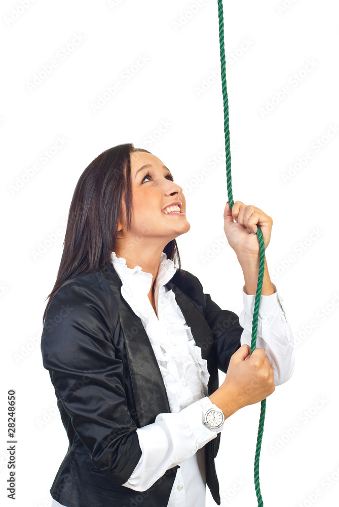 Business woman climb rope and looking up Business woman climb rope and looking up