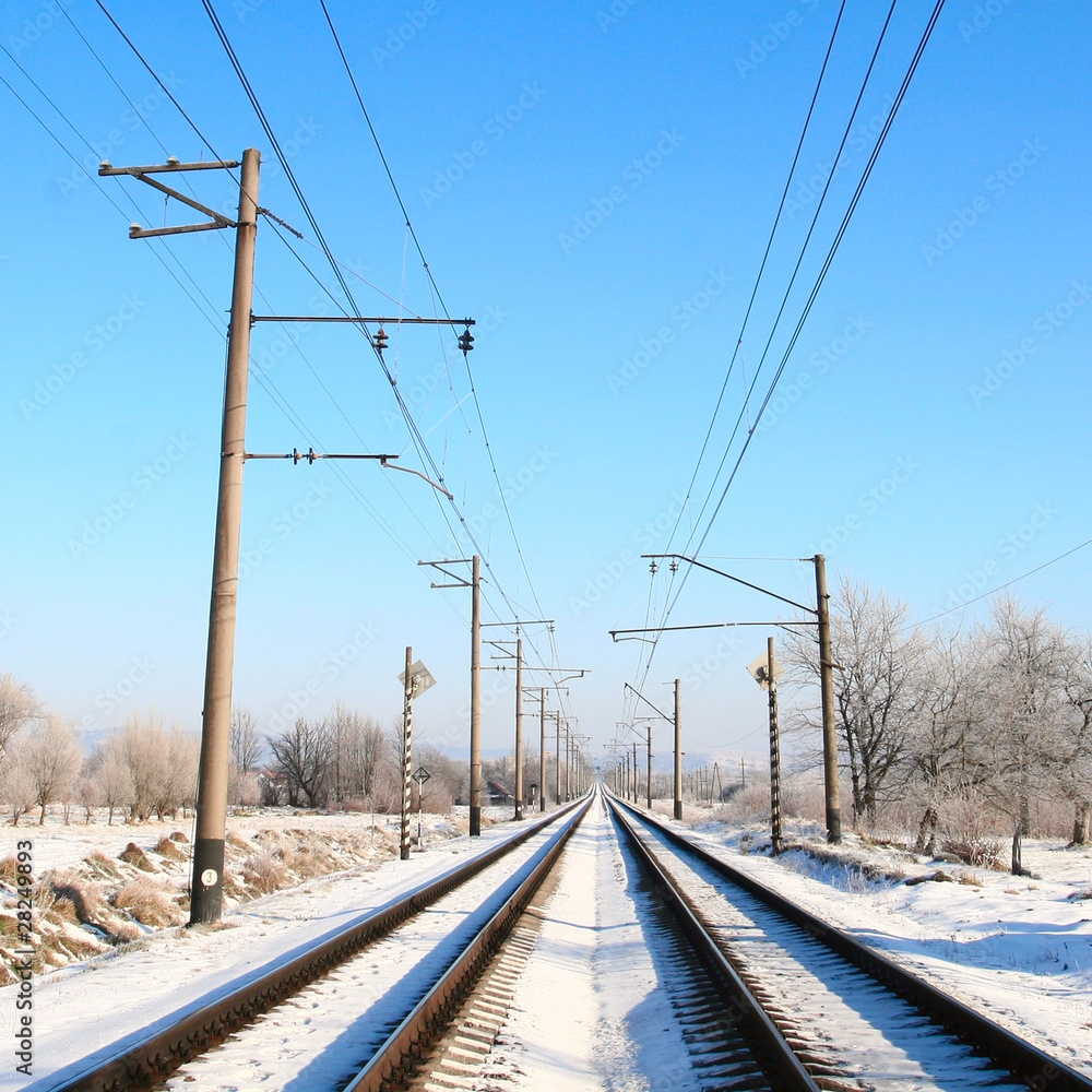 Railway tracks covered with snow