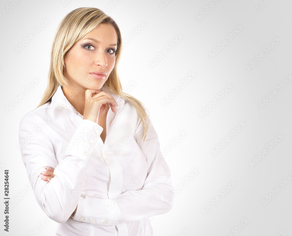 A young and smart blond businesswoman in formal clothes A young and smart blond businesswoman in formal clothes
