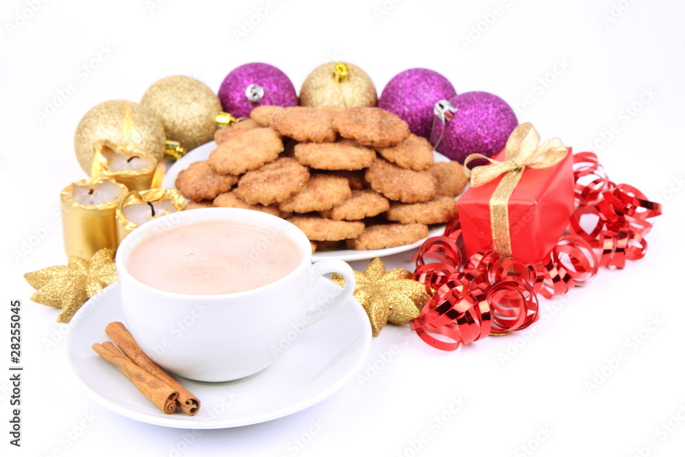 Cup of hot cocoa, cinnamon cookies and christmas decoration
