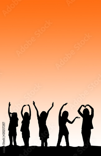 silhouettes of young woman in orange sunset . © rufous