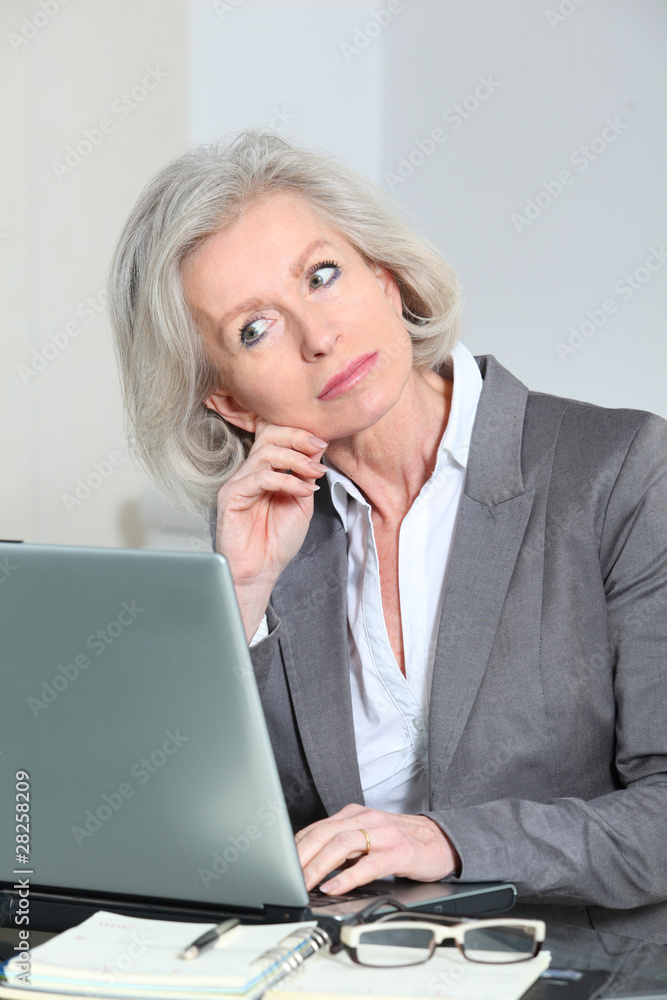 Senior businesswoman working in the office