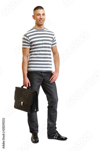handsome man with suitcase in studio