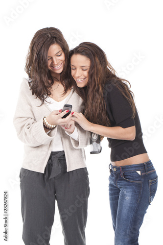 two women looking at the cellphone