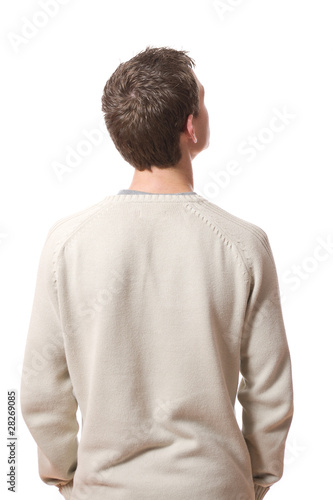 back of pensive young man looking up isolated on white