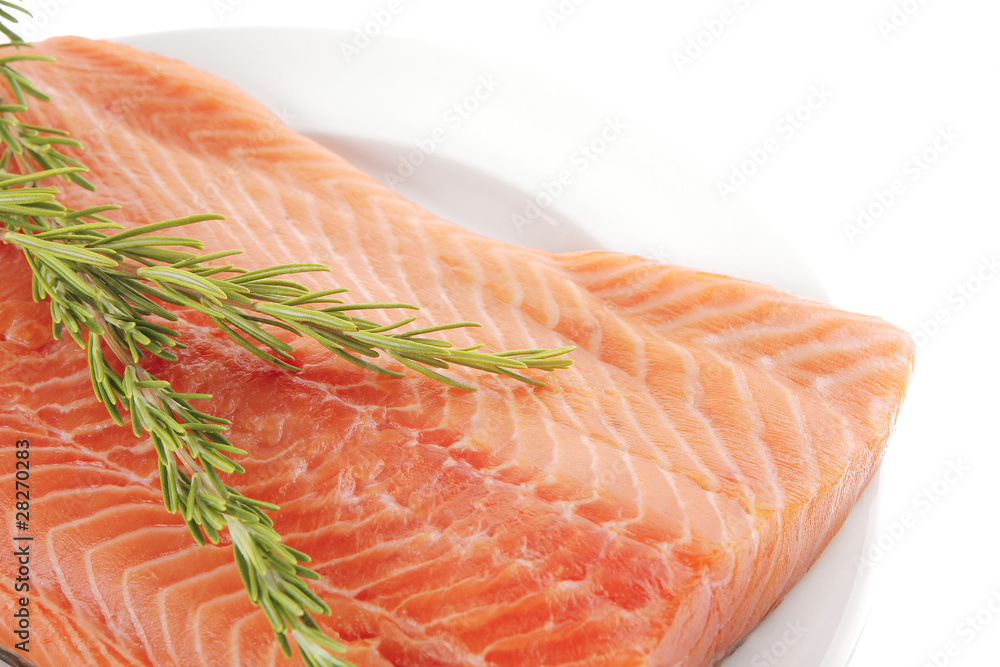raw salmon fillet on white and rosemary raw salmon fillet on white and rosemary
