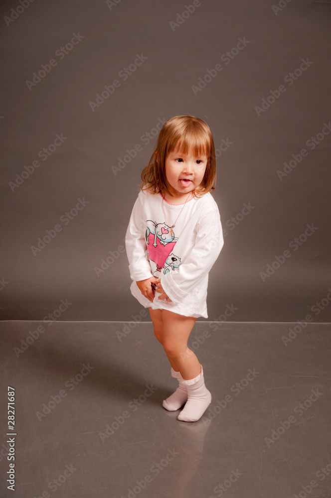 Funny little girl in sleeping suit Funny little girl in sleeping suit