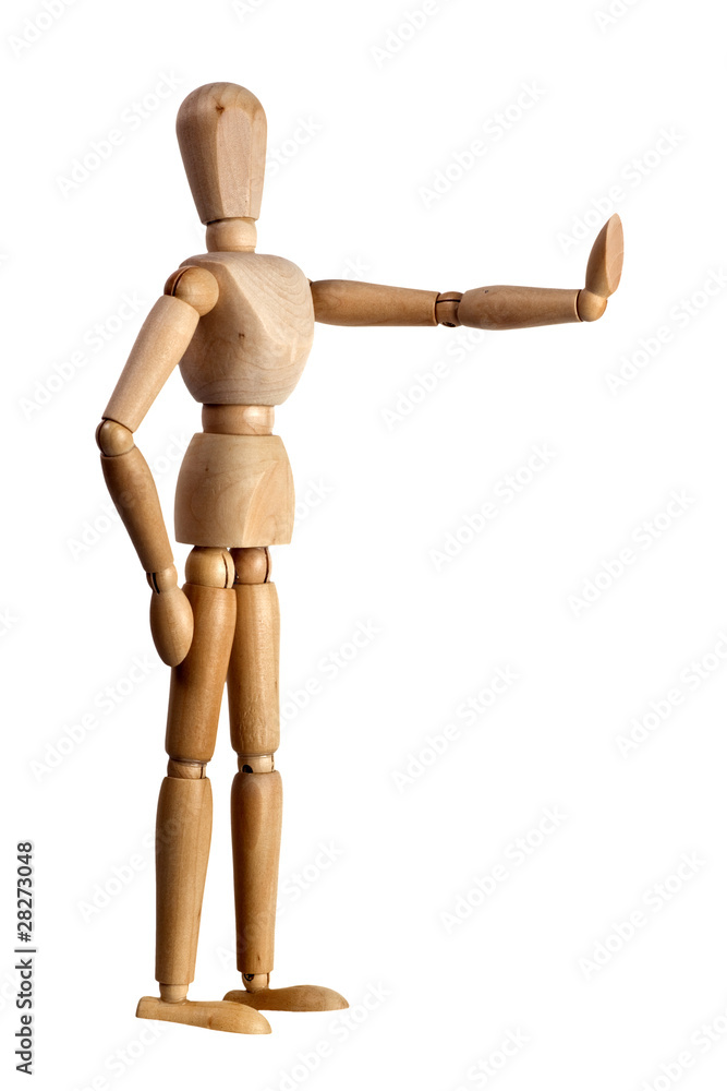 Wooden mannequin showing stop sign with its hand isolated Wooden mannequin showing stop sign with its hand isolated