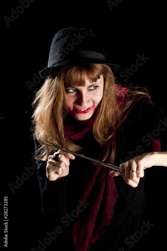 dark girl with red scarf and black hat rusty scissors
