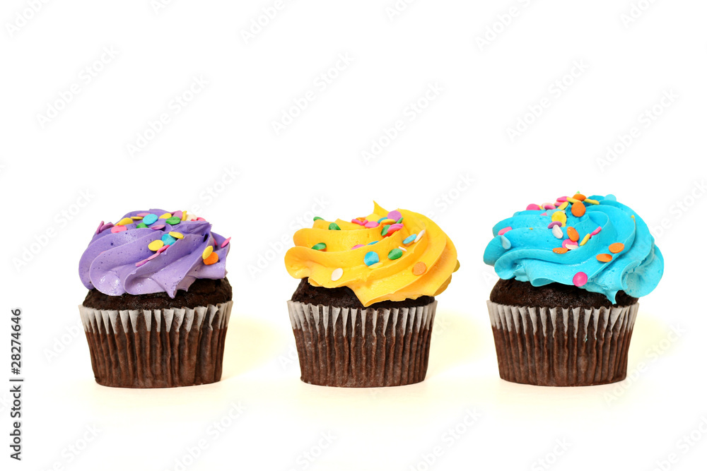 Three colorful cupcakes