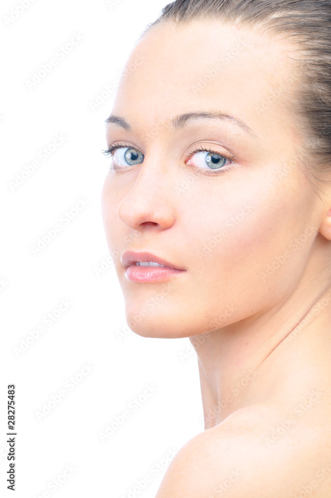 Fototapeta premium portrait of a young beautiful woman looking at camera, isolated