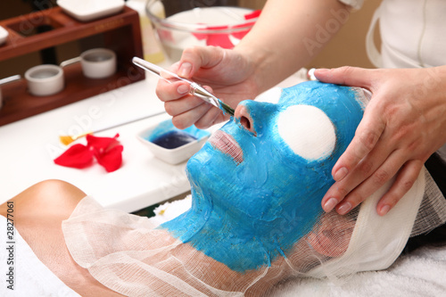 woman getting a beauty mask