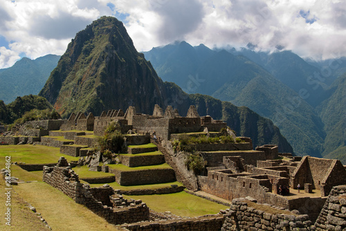 Wayna Picchu framed in three doorway ruins group
