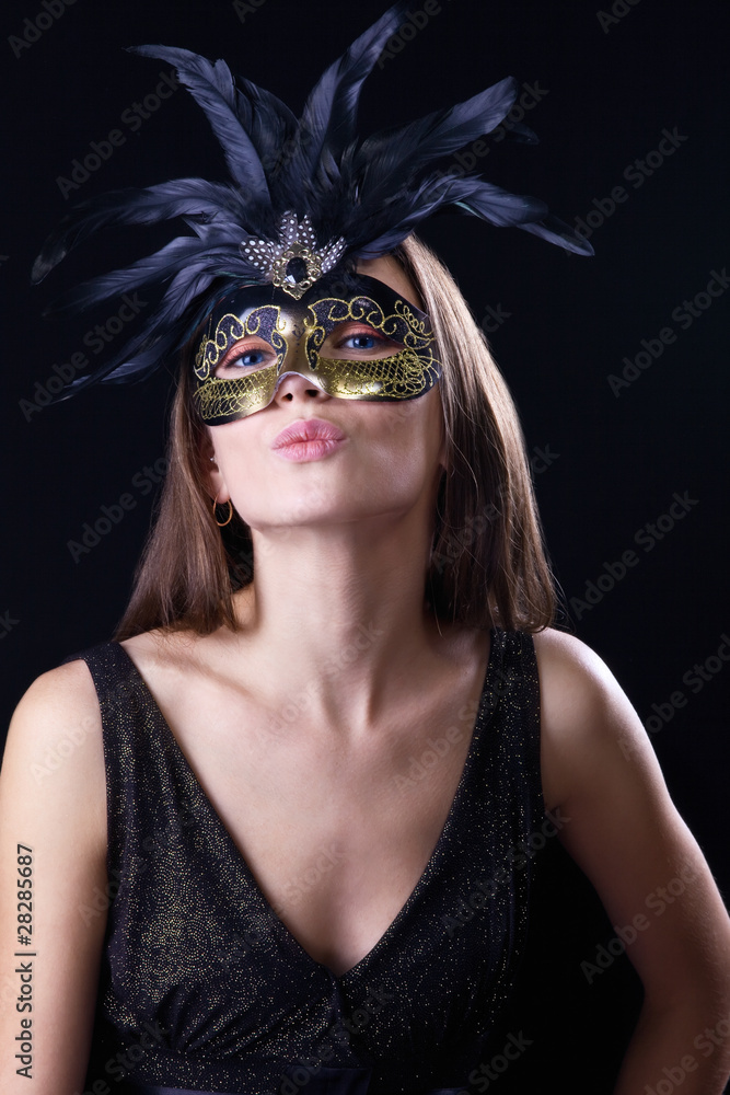 Fototapeta premium woman in mask kiss you