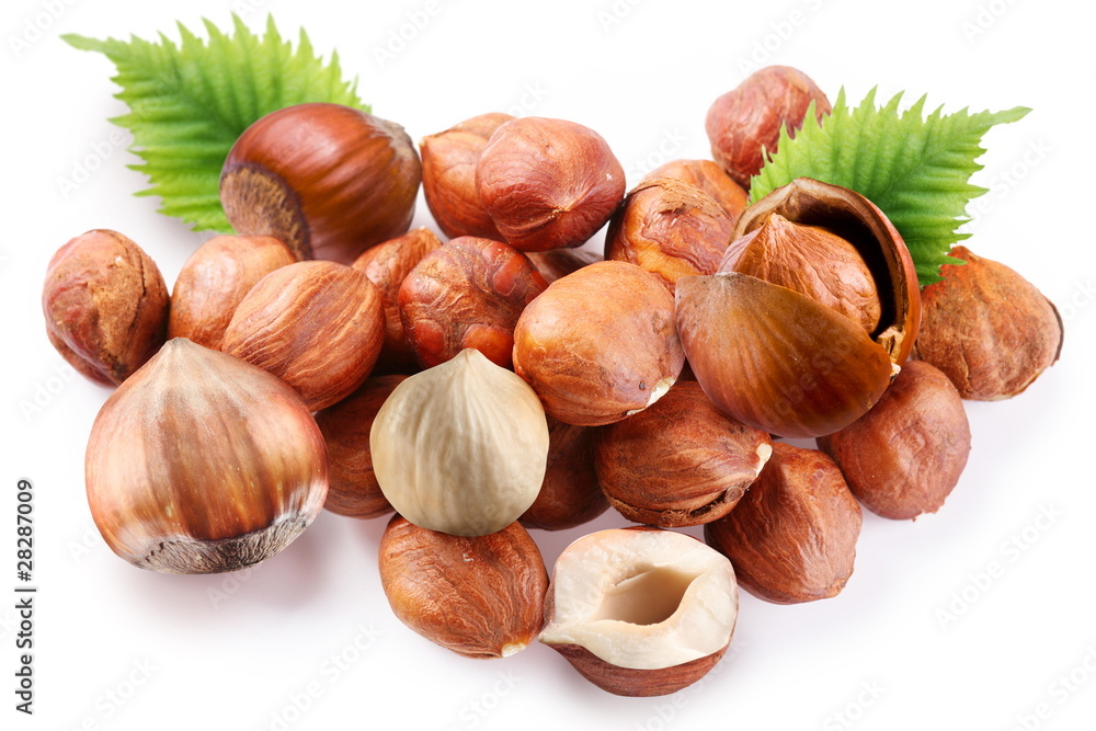 Filberts with leaves on white background Filberts with leaves on white background