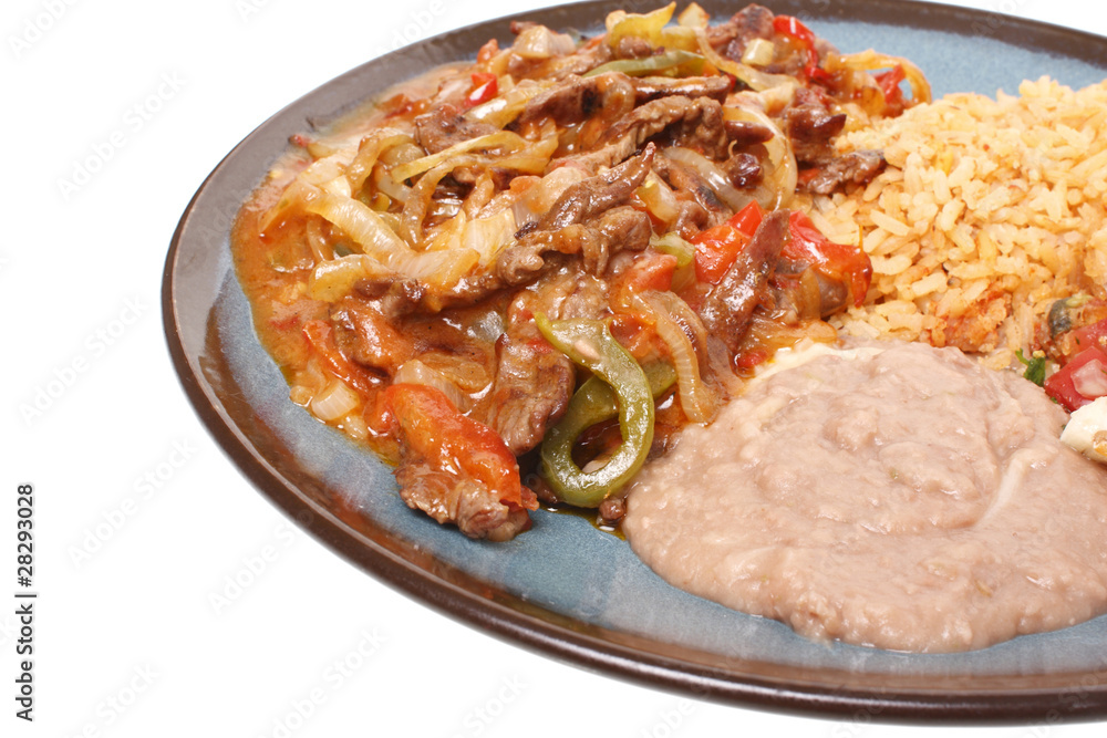 Steak fajitas with beans and rice. Steak fajitas with beans and rice.