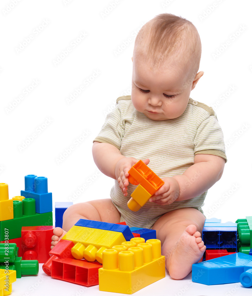 Little boy with building bricks Little boy with building bricks