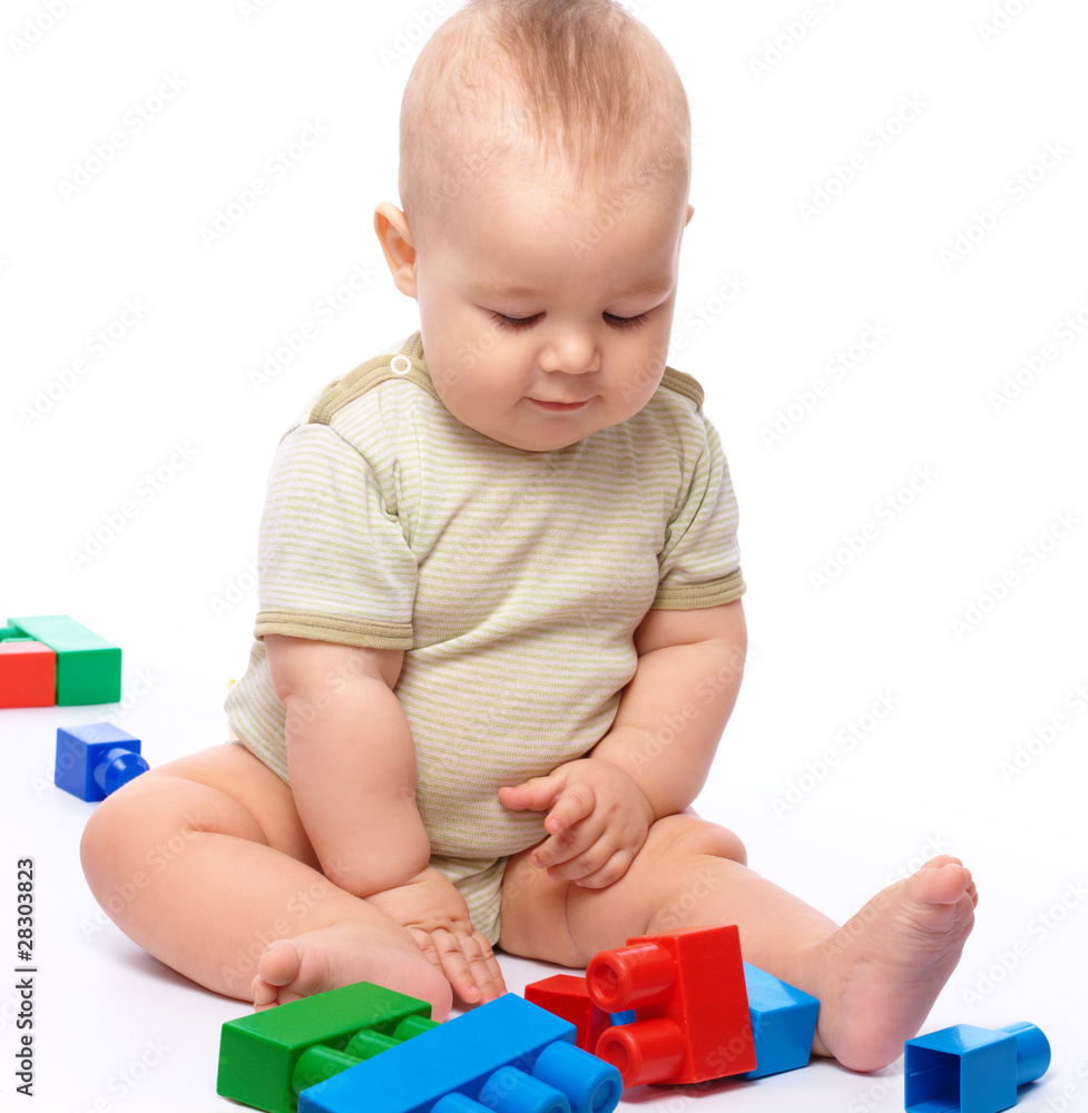Little boy with building bricks Little boy with building bricks