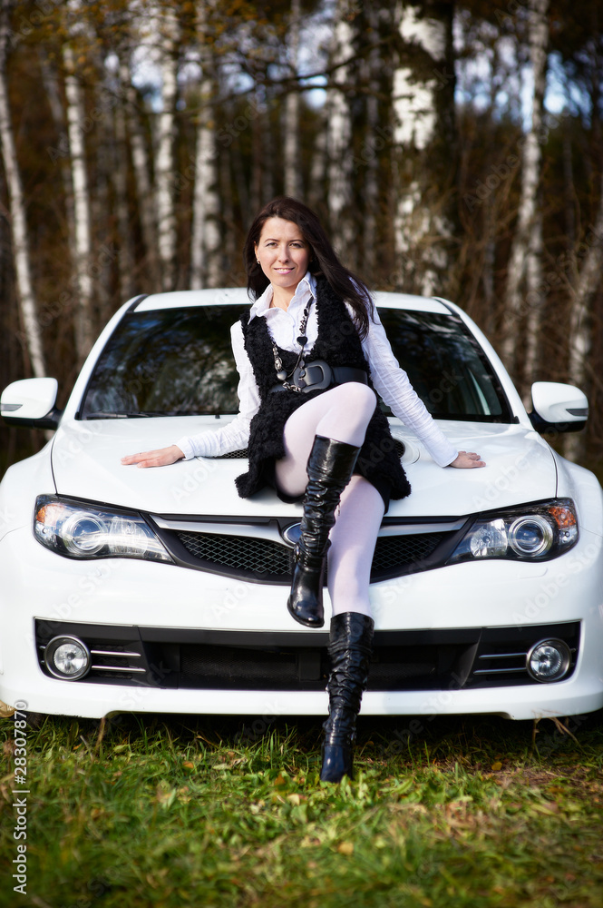 Beautiful girl and stylish white sports car Beautiful girl and stylish white sports car