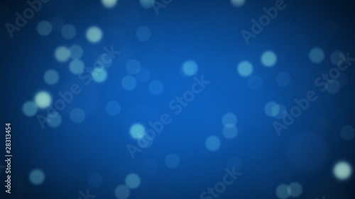 Blue abstract Christmas background with bright bokeh lights
