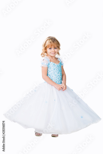 cute little girl wearing fluffy gown
