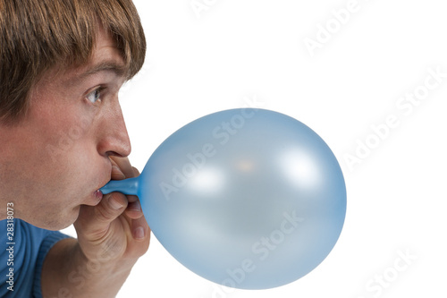 man inflating blue balloon