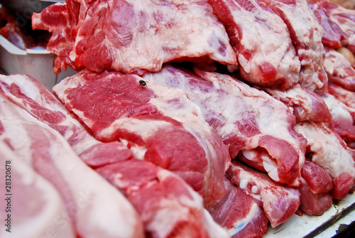 Pile of raw pork meat in fresh market