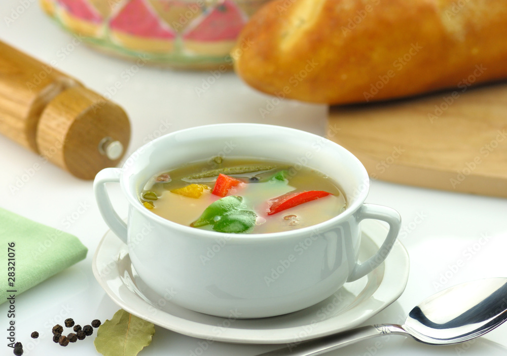 vegetable soup in a white soup cup vegetable soup in a white soup cup