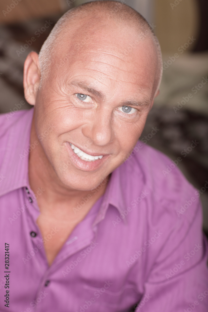 Headshot of a mature adult male smiling Headshot of a mature adult male smiling